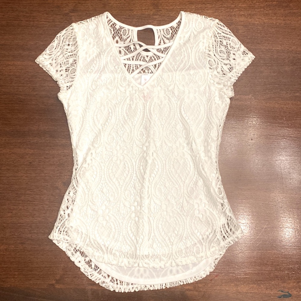 NoBo short sleeve white blouse with lace overlay.